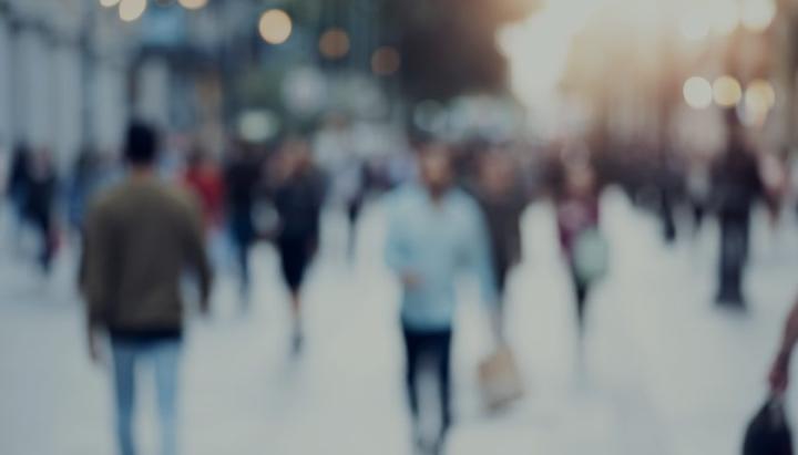 A blurred crowd on a city street